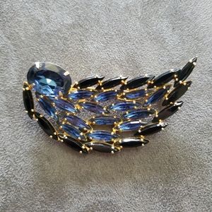 Blue rhinestone brooch